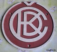 suche Fabrikschild/Firmenlogo 